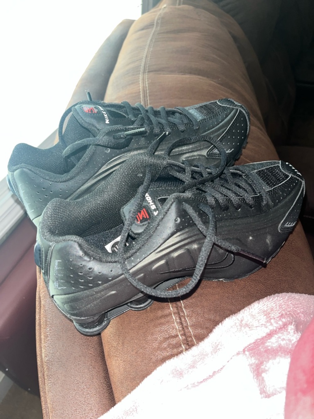 Nike Kids Black Sneakers with Small Red Logo